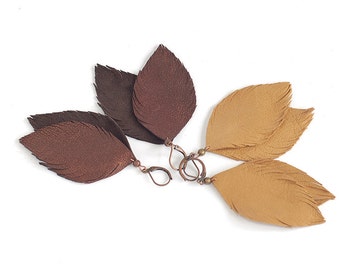 Leather feather earrings in copper brown and in light brown. Set of two pairs