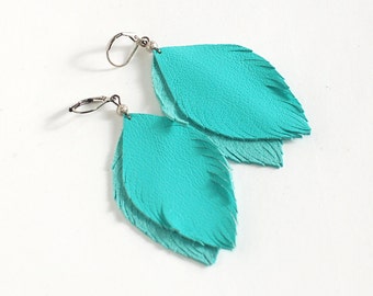 Blue feather leather earrings