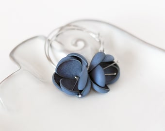 Modern style leather earrings in blue