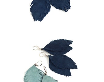 Set of two pairs feather earrings from suede leather in smoky blue and navy blue.