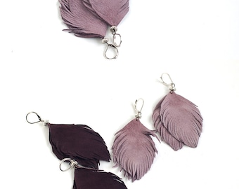 Set of two pairs feather earrings from dark violet and smoky violet suede leather.