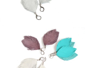 Leather or suede feather earrings in bright turquoise blue, light grey or smoky violet. One pair