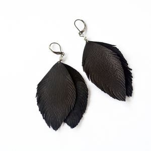 Black feather leather earrings image 1