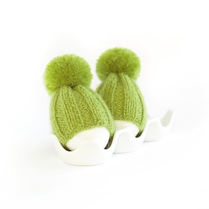 Grass green color egg warmers. Egg hats for Easter breakfast decoration