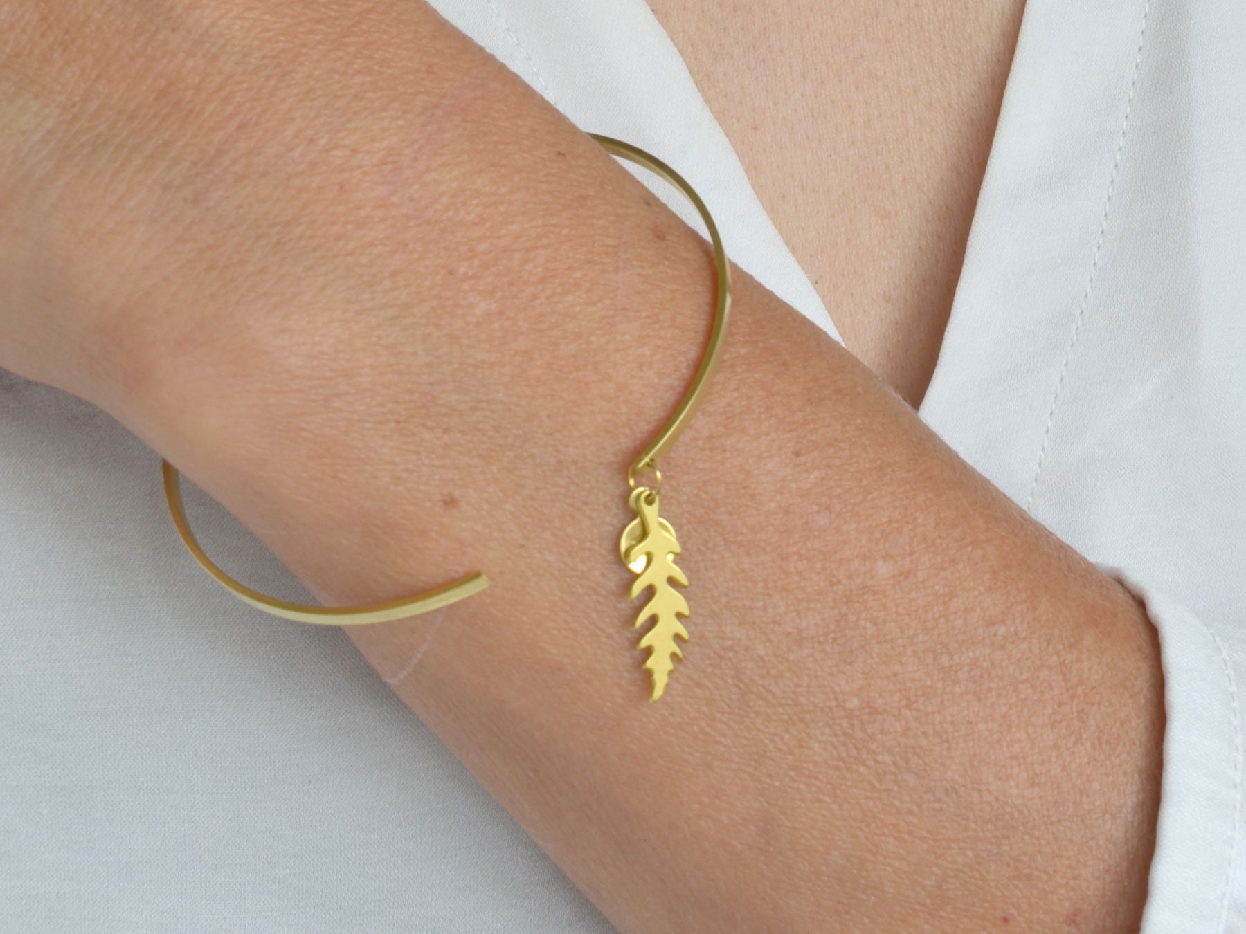 Fern bracelet cuff bangle in gold fern leaf minimalism modern boho style cuff handmade jewelry by renna deluxe