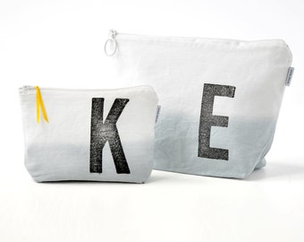 Toiletry bag dip dyed in Grey monogrammed with the letter of your choice Canvas monogram by renna deluxe