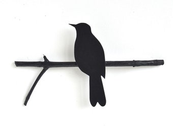 Blackbird on a perch, wall object made by renna deluxe