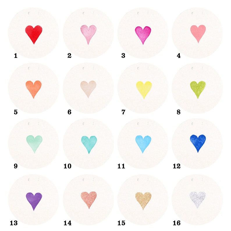 May include: Sixteen white circles with a heart in the center, each heart is a different color. The colors are red, pink, magenta, light pink, orange, light pink, yellow, green, light blue, turquoise, blue, dark blue, purple, coral, gold, and silver.