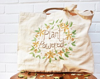 plant powered slogan tote bag recycled calico ( vegan )