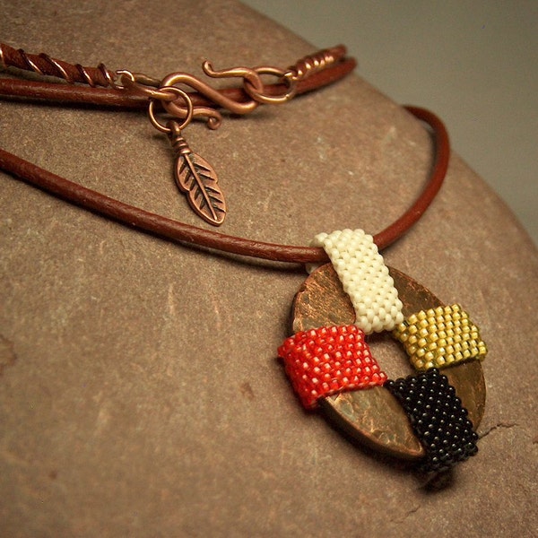 Beadwork pendant necklace in Native American medicine wheel colors beaded on a copper washer