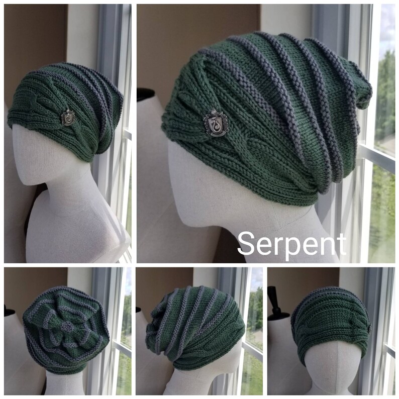 May include: Green and gray knit beanie with a silver emblem that says "Serpent". The beanie is on a mannequin head.