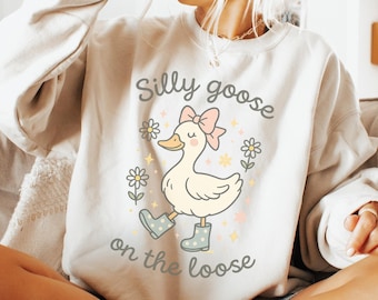 Dumme Gans auf dem losen PNG, niedliche Frühlingsgans-Sublimation, Boho-Blumenkoketten-Ente, lustiges Girly Tierhemd, adrettes modisches Design