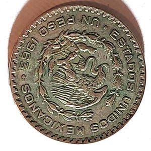 1963 One Peso Estados Unidos Mexicanos with Free Shipping.