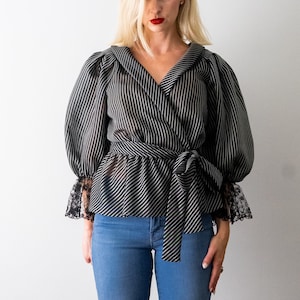 1980&#39;s black striped blouse. vintage 80&#39;s peplum blouse. balloon sleeves. wrap. silver stripes. m. s.