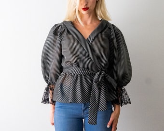 1980's black striped blouse. vintage 80's peplum blouse. balloon sleeves. wrap. silver stripes. m. s.