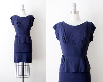 50’s wiggle dress. Vintage 1950 navy blue dress. Tiered peplum skirt. crepe. xs.