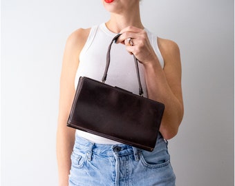 1960's Brown Leather Mini Bag. 60s rectangle bag. saks fifth avenue. dark brown. top handle.