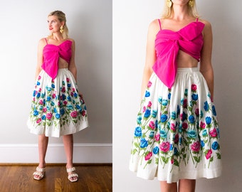 1950's floral skirt. vintage 50's blue pink flower skirt. painted flower print. white. full pleated. small.