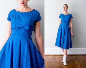 vintage 1950's blue party dress. 50's full pleated dress. bow. empire waist. small dress.