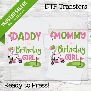 May include: White t-shirts with the text "DADDY of the Birthday GIRL" and "MOMMY of the Birthday GIRL" in pink and green. Each shirt features a pink golf cart with balloons and a golf flag. The image also includes the text "DTF Transfers" and "Ready to Press!"
