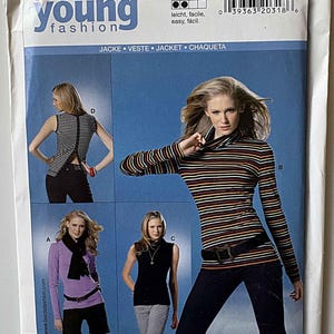 May include: A sewing pattern package with the "burda young fashion" logo. The package features images of women wearing various tops and a striped long-sleeve shirt. The text includes "JACKE VESTE JACKET CHAQUETA" and size information.