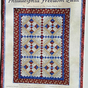 May include: A quilt pattern for a "Philadelphia Freedom Quilt" by Debbie Beaves of The Violet Patch, Inc. The quilt is pieced by Pat Day and quilted by Jennifer Cosman of Cosman & Young Quilting. The quilt is made using the Charlotte fabric collection designed by Debbie Beaves for RJR Fabrics. The finished size of the quilt is 44 1/2 inches by 61 1/2 inches.