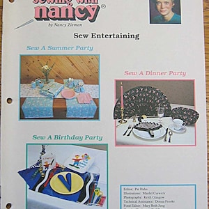 May include: Sewing with Nancy magazine cover featuring a blue and white floral table runner, a pink and white floral table runner, and a birthday party table setting with a yellow plate, red and green pencils, and a party hat. The magazine cover also includes the text "Sew Entertaining" and "Sew A Summer Party", "Sew A Dinner Party", and "Sew A Birthday Party".
