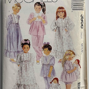 May include: McCall's sewing pattern featuring illustrations of children's sleepwear designs. The designs include long dresses, pajama sets, and a short set, all with ruffles and bows. The pattern's cover is white with the brand name at the top.