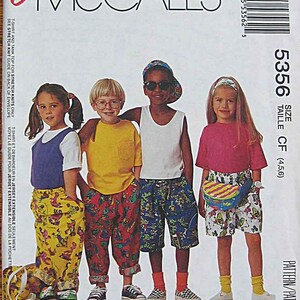 May include: A sewing pattern for children's clothing. The pattern is for sizes 4, 5, and 6. The pattern includes instructions for making a t-shirt, tank top, and shorts. The pattern is from McCall's Easy line. The pattern is called "Learn to Sew for Fun".