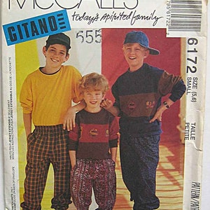 May include: A sewing pattern for children's clothing. The pattern is for a pair of pants and a shirt. The pattern is from McCall's and is called "Citano". The pattern number is 555 and the size is 5-6. The pattern is for a petite size.