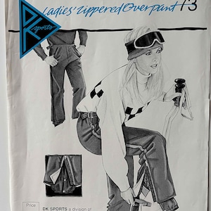 May include: An illustration of a vintage advertisement for DK Sports Ladies' Zippered Overpants. The image features a woman in ski attire, a close-up of the pants, and another person wearing the pants. The text "Ladies' Zippered Overpant 73" is visible.