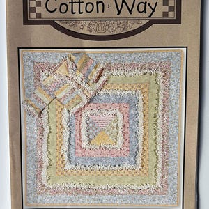 May include: A quilt pattern booklet with a colorful quilt design on the cover. The title is "Sweet Lullaby" and the pattern number is #816. The booklet is from Cotton Way.