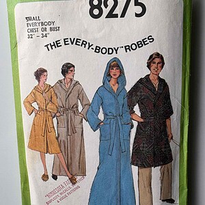 May include: Vintage Simplicity pattern 8275 for "The Every-Body Robes." The pattern features illustrations of robes in various colors and patterns. The pattern size is for a chest or bust of 32"-34". The package is green and white.