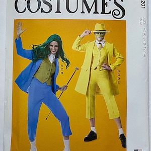 May include: A sewing pattern for two costumes. The pattern is for sizes 6-8-10-12-14. The first costume is a blue suit with a green vest and a green wig. The second costume is a yellow suit with a green mask and a hat. The pattern is from McCall's Costumes.