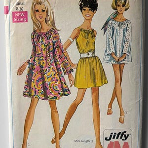 May include: Vintage Simplicity sewing pattern 7689. The pattern features illustrations of three mini-length dresses. The pattern includes the text "Miss Small 8-10" and "easy cut easy sew". The pattern is marked "Jiffy" and "NEW Sizing".