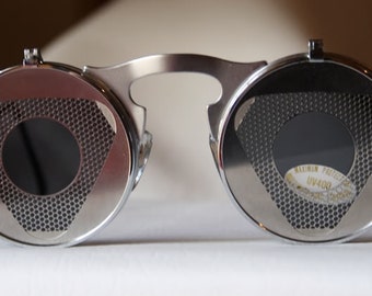 round flip up sunglasses flip ups silver metal Steampunk sunglasses wearable art performing artist styling video shoot unusual eyewear
