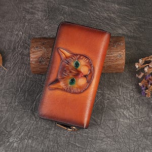 Nuevo bolso de mano ligero de lujo con ranuras para tarjetas y diseño de gato en relieve