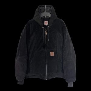 May include: A black corduroy zip-up jacket with a hood. The jacket has a brown patch on the front with the word "JAM" on it.