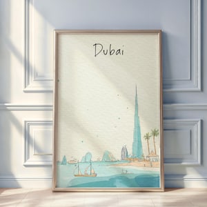 Puede incluir: Impresión artística enmarcada con una ilustración en acuarela de Dubái. La obra representa el Burj Khalifa, veleros y una escena de playa, con la palabra "Dubai" escrita en la parte superior. El marco es de color oro claro.