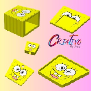 May include: A collection of yellow SpongeBob SquarePants-themed items, including a box, a small square, and several square cutouts. The items feature SpongeBob's face and are set against a gradient background with the word "Criativo".