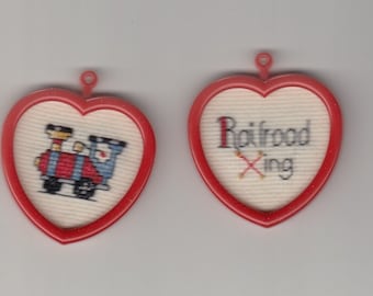 Set of two Railroad Xing heart-shaped cross-stitch ornaments