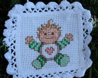 Cross-Stitched Baby on Doily Ornament