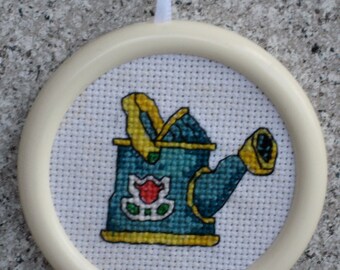 Double Sided Watering Can/Flowers Cross Stitch Ornament in White Frame