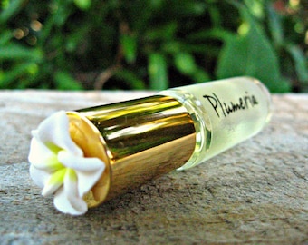 PARFUM PLUMERIA HAWAÏEN. Contient de l'huile essentielle et du parfum de Plumeria. Mini parfum à bille. 1/6 once liquide (5 ml).