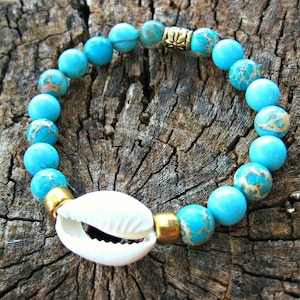 COWRIE SHELL BRACELET: With Sea Sediment Jasper and Gold Accents. Stretchy bracelet. Gift from Hawaii.