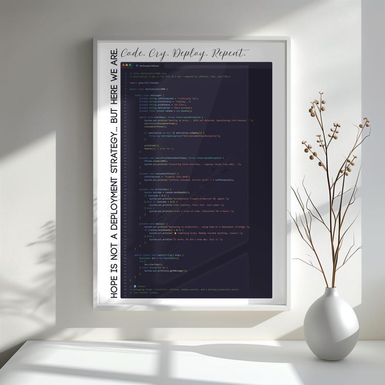 May include: A framed print with the text "Code. Cry. Deploy. Repeat." in a cursive font at the top. The print features lines of code in a dark colour, with the text "HOPE IS NOT A DEPLOYMENT STRATEGY... BUT HERE WE ARE." on the left side.