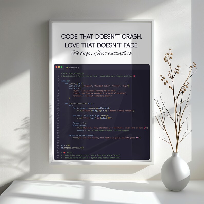 May include: A framed print with the text "CODE THAT DOESN'T CRASH, LOVE THAT DOESN'T FADE. No bugs. Just butterflies." The print also features computer code. A white vase with branches is to the right.