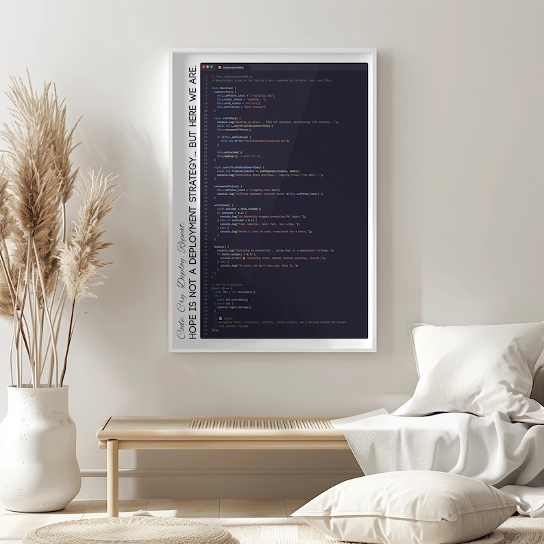 May include: A framed print featuring lines of computer code in various colors against a dark background. The white frame surrounds the image, and text on the side reads, "Code. Cry. Deploy. Repeat. HOPE IS NOT A DEPLOYMENT STRATEGY... BUT HERE WE ARE."