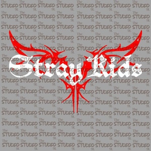 May include: Gray background with a repeating pattern of "The Studio" text. The central design features the word "Stray Kids" in white, overlaid with a red, stylized wing-like graphic.