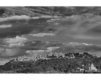 Fine Art Black & White Landscape Photography of a Dramatic Sky and Clouds Over the Tuscan Hilltown of Montepulciano